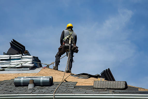 Professional Gutter Installation technician working in Milan, KS